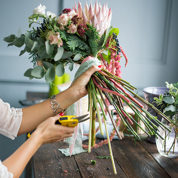 girl cutting flowers