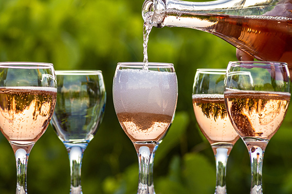 Toasting with four glasses of Champagne